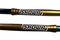 Two Showa suspension forks on a white background