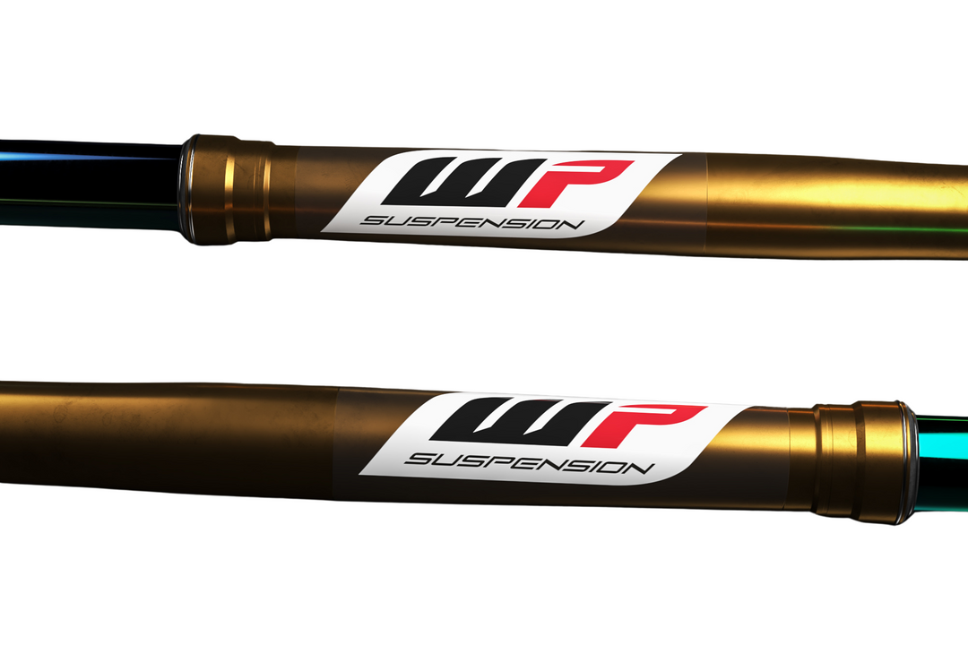 Two WP Suspension shock absorbers on a white background